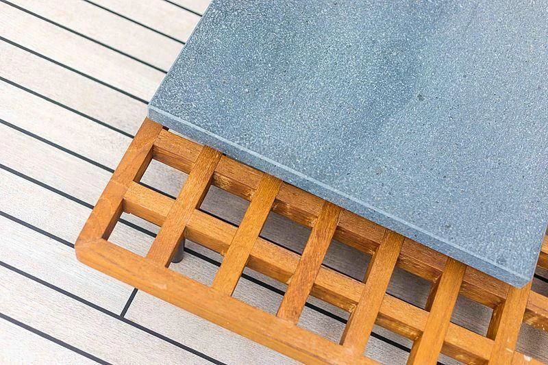 a chair on a wooden floor aboard BACCHANAL Yacht for Sale