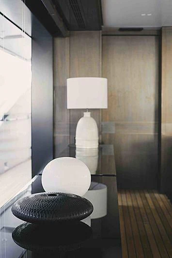 a toilet with a lamp on top aboard BACCHANAL Yacht for Sale