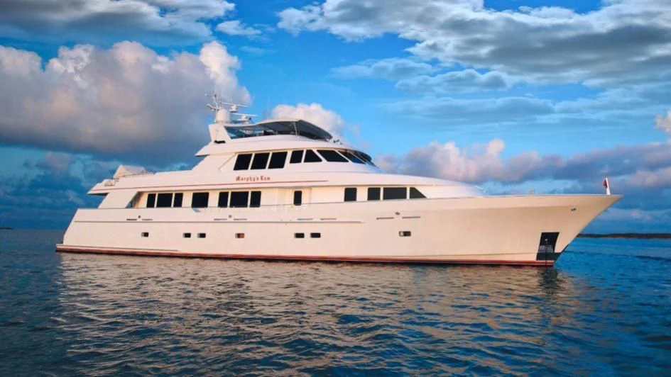 a large white boat in the water aboard MURPHY'S LAW Yacht for Charter