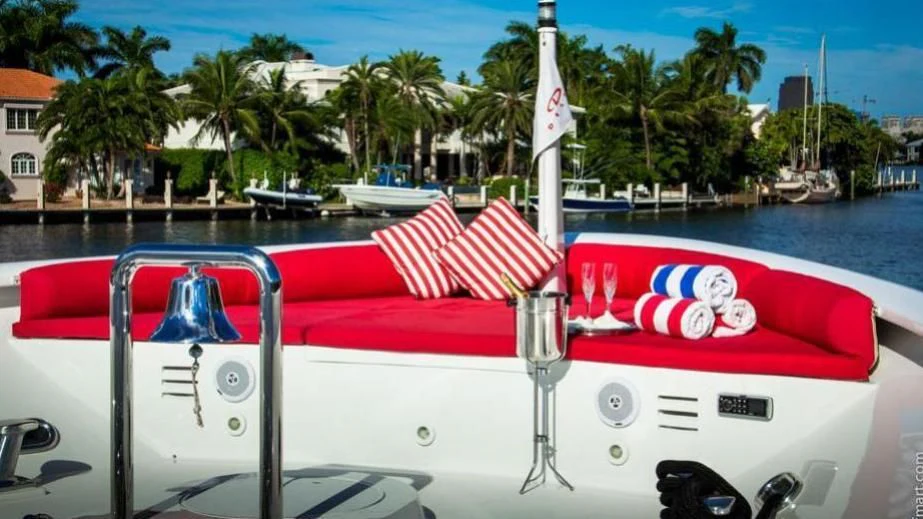 a boat with a flag on the front aboard MURPHY'S LAW Yacht for Charter