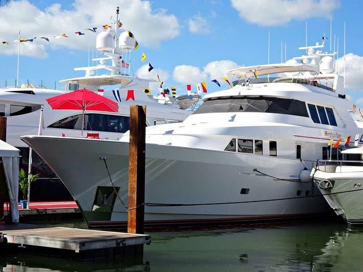 a large white yacht docked aboard MURPHY'S LAW Yacht for Charter