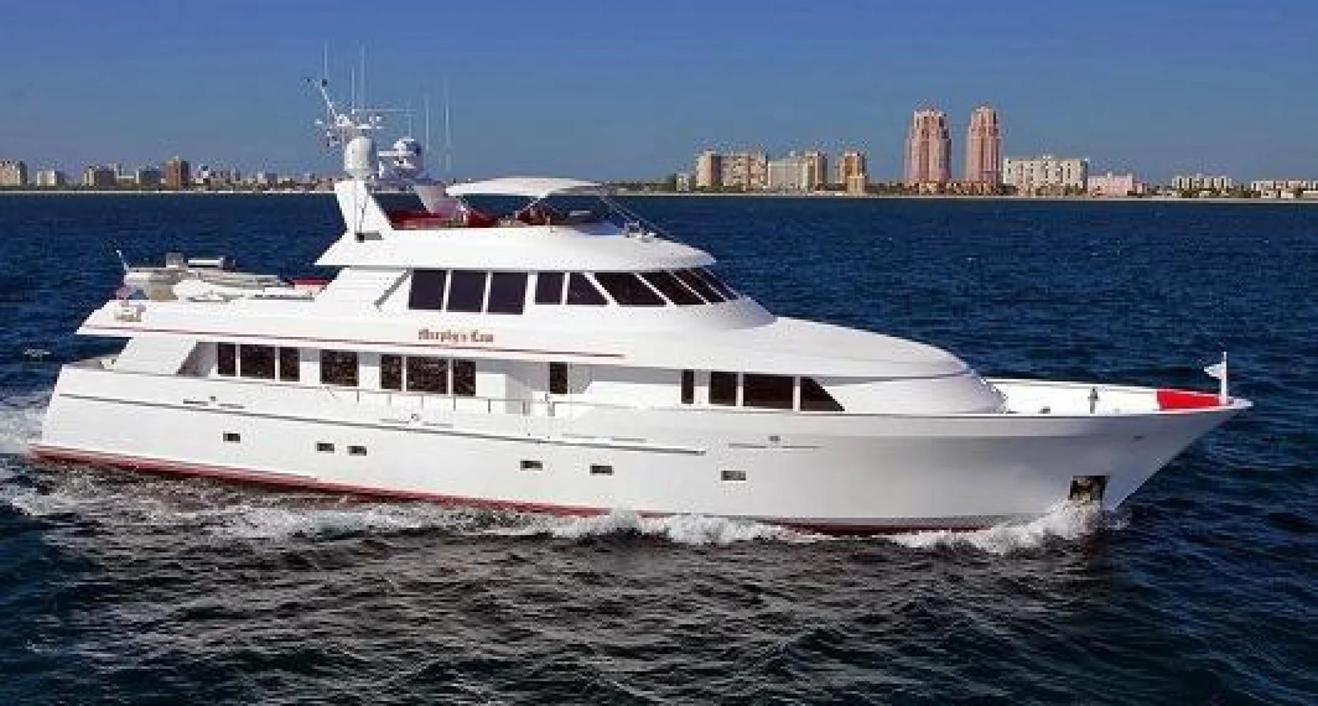a large white boat in the water aboard MURPHY'S LAW Yacht for Charter