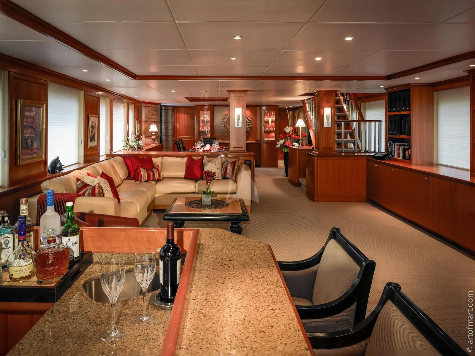 a room with a table and chairs aboard MURPHY'S LAW Yacht for Charter