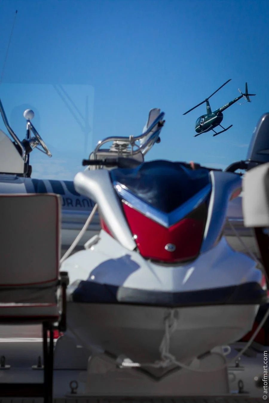 a white and red robot aboard MURPHY'S LAW Yacht for Charter
