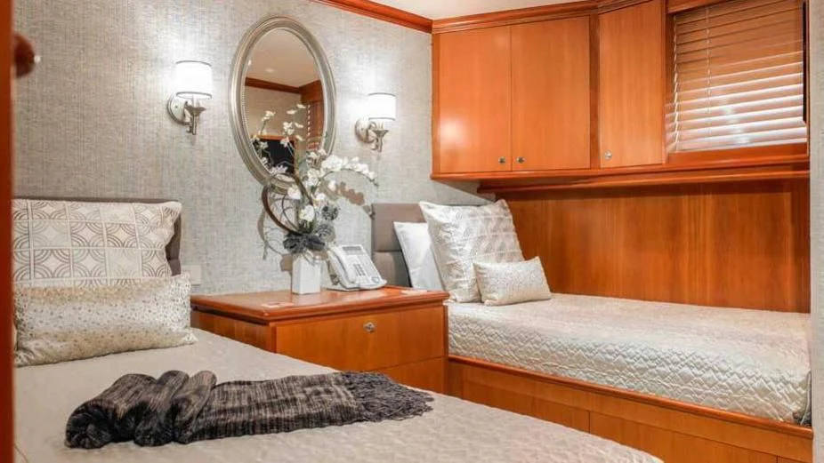 a couple of beds in a room aboard MURPHY'S LAW Yacht for Charter