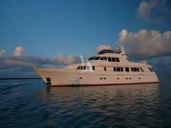 a large white ship in the water aboard MURPHY'S LAW Yacht for Charter