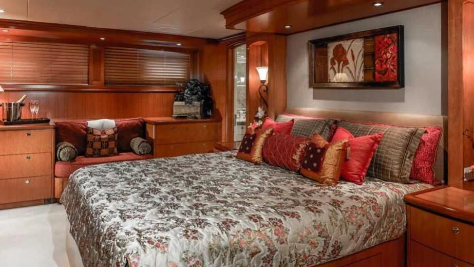 a large bed with a large bed aboard MURPHY'S LAW Yacht for Charter