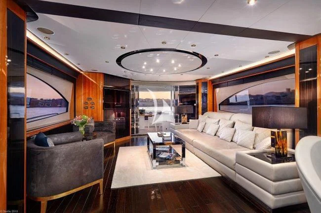 a living room with a large glass ceiling aboard PEARL OF LONDON Yacht for Sale