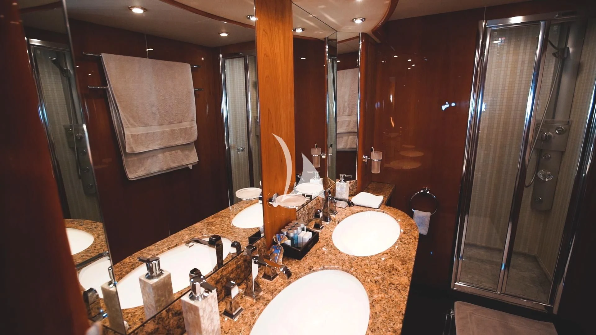 a bathroom with a large mirror aboard PEARL OF LONDON Yacht for Sale
