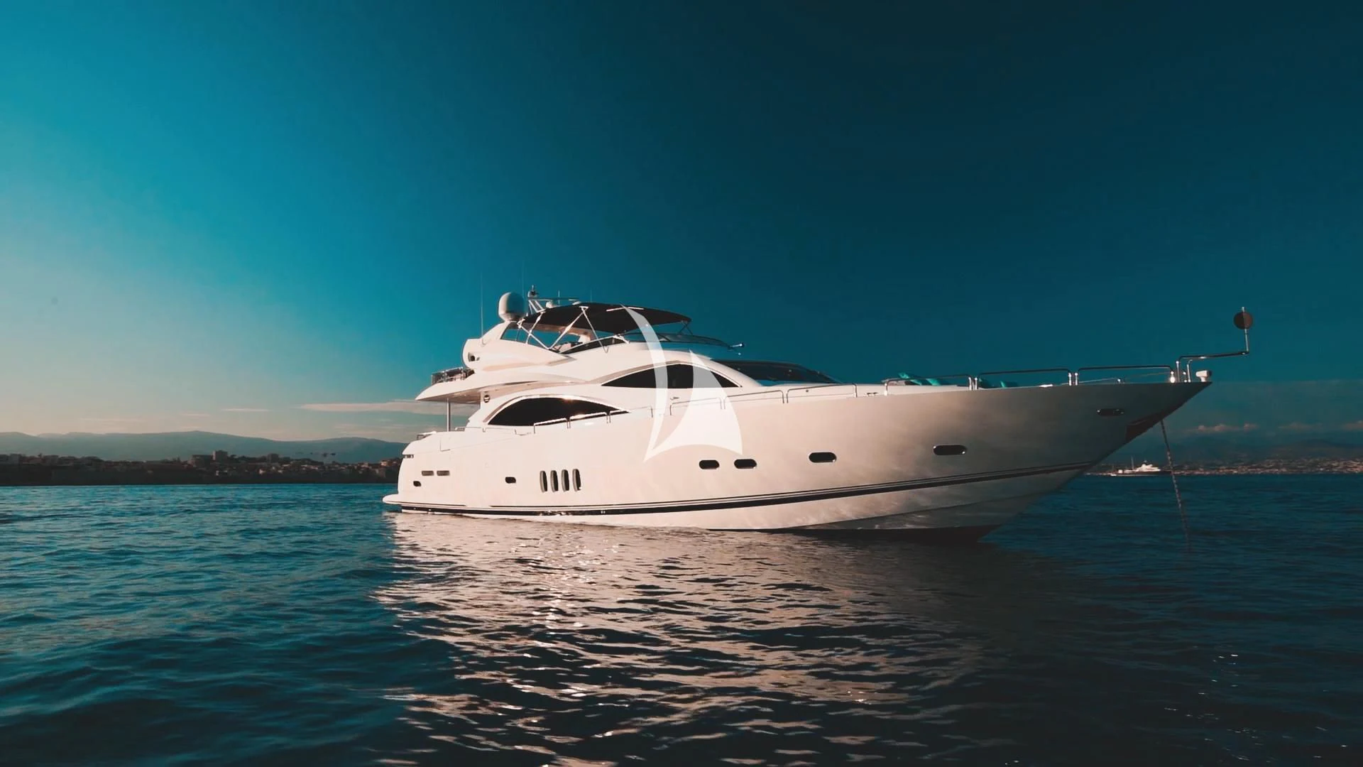 a white boat in the water aboard PEARL OF LONDON Yacht for Sale