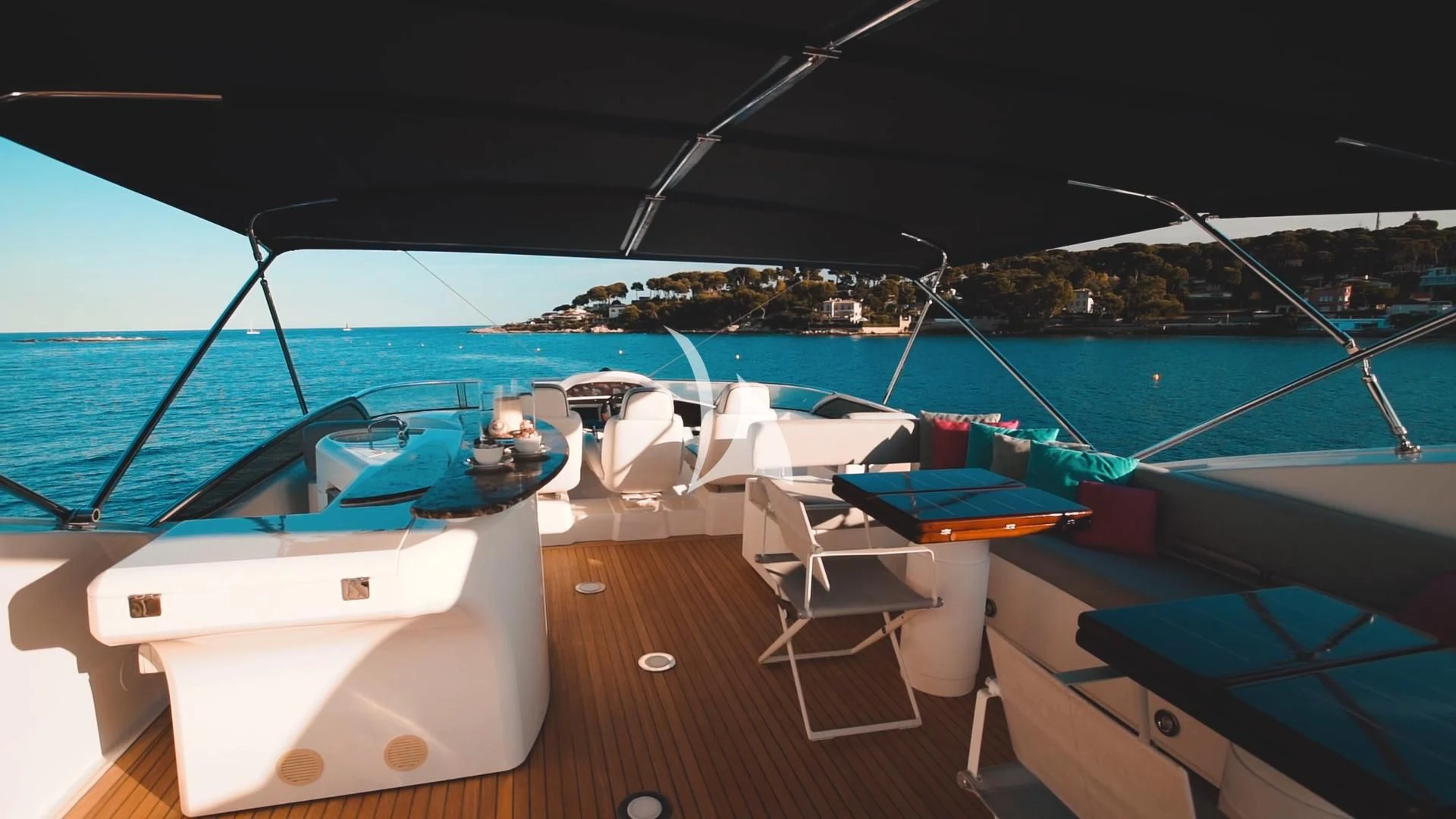 a deck with a view of a city and water aboard PEARL OF LONDON Yacht for Sale