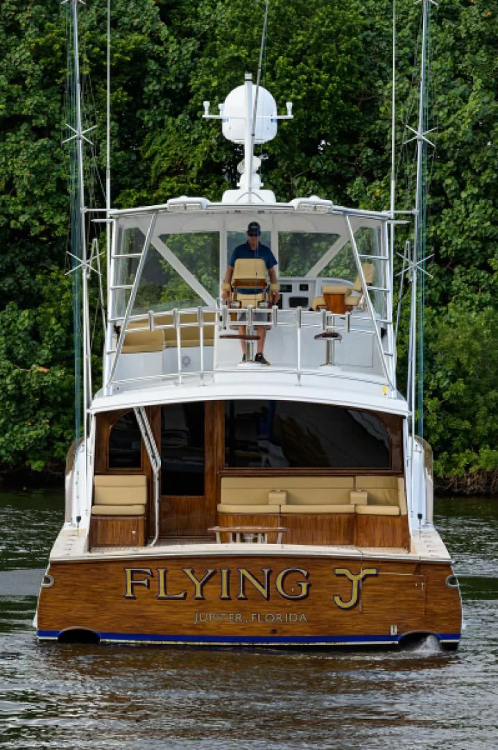 a person standing on a boat aboard FLYING J Yacht for Sale