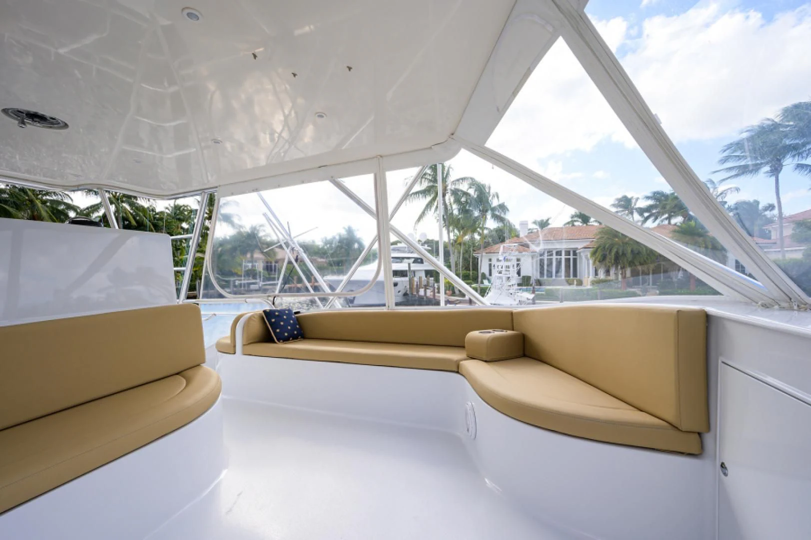 a room with a window and a view of trees and buildings aboard FLYING J Yacht for Sale