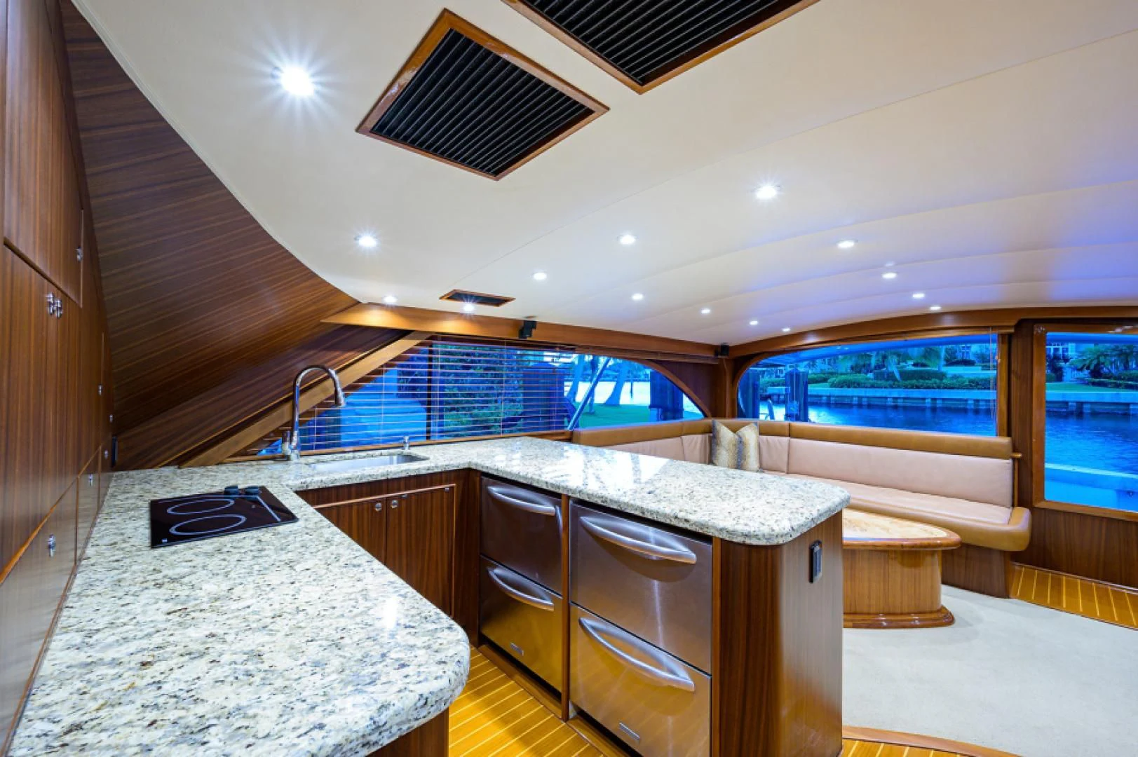 a kitchen with a large island aboard FLYING J Yacht for Sale