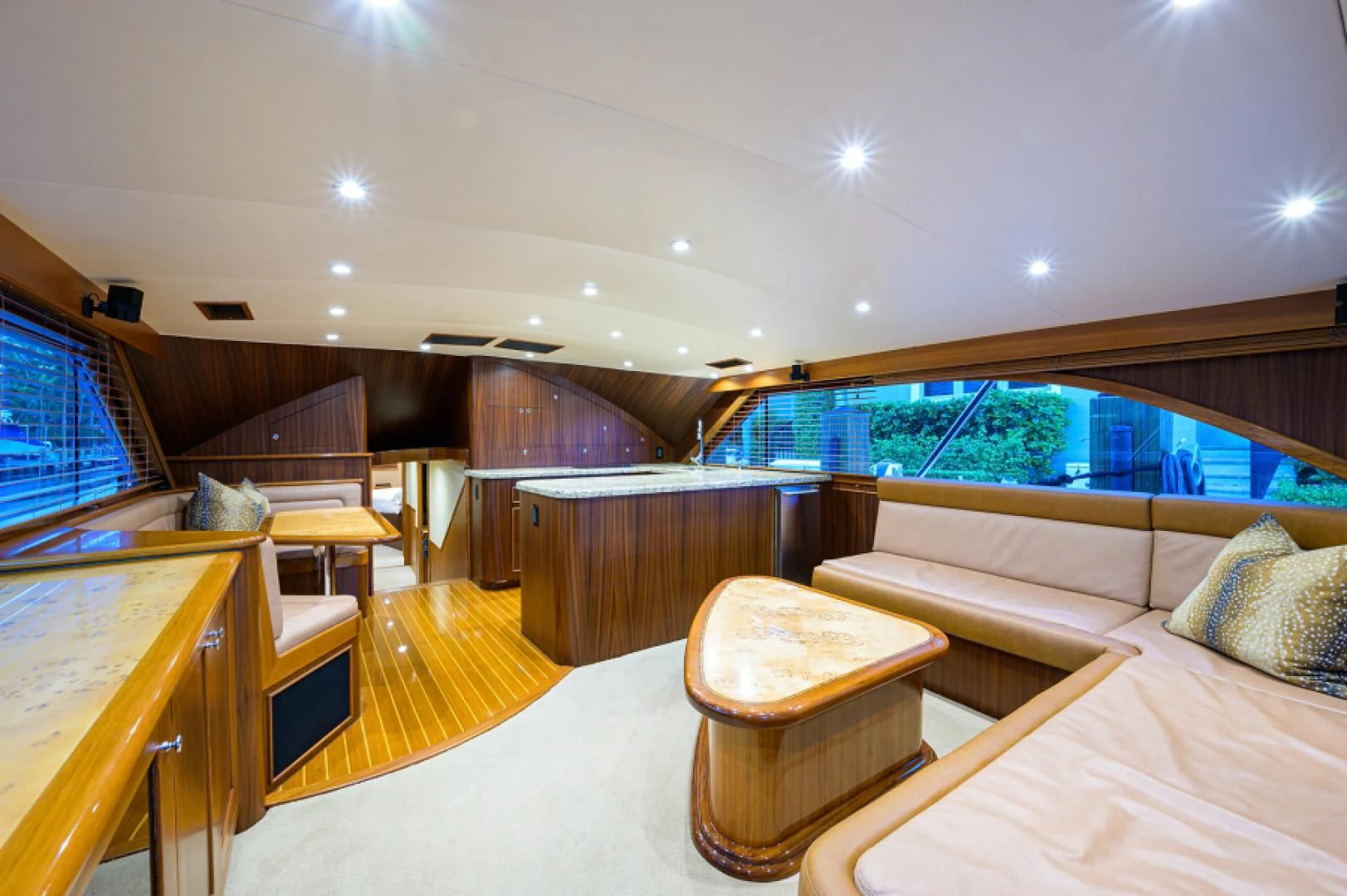 a room with a bed and a table aboard FLYING J Yacht for Sale