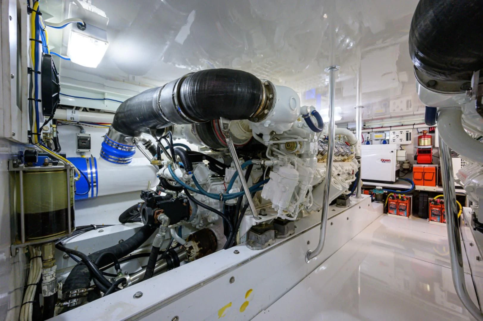 a large white machine with a large metal pipe aboard FLYING J Yacht for Sale