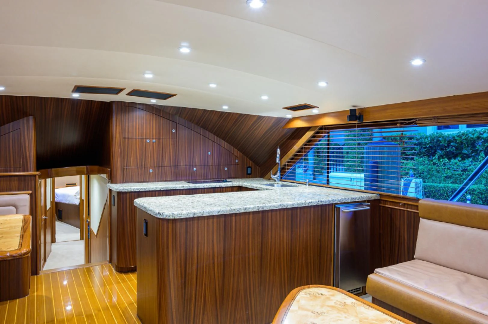 a room with a table and chairs aboard FLYING J Yacht for Sale