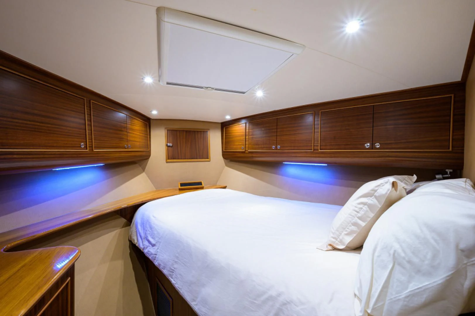 a room with wooden cabinets aboard FLYING J Yacht for Sale