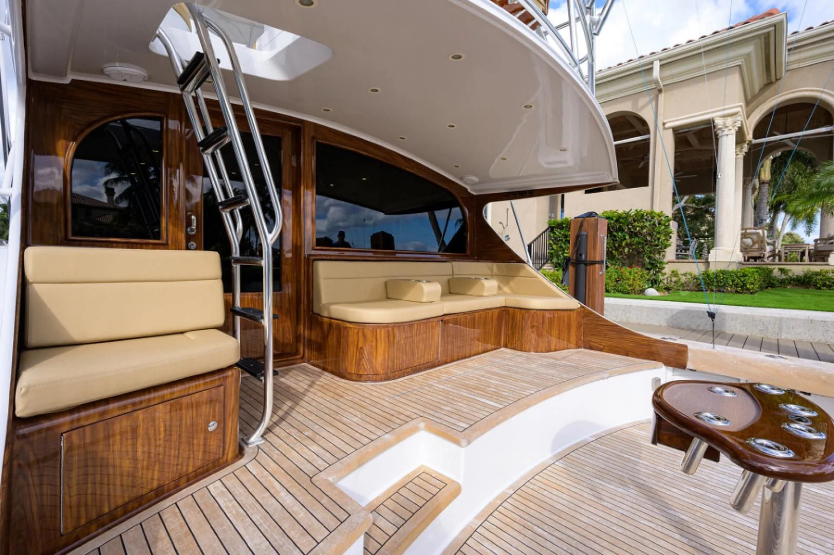 a deck with a couch and a ladder aboard FLYING J Yacht for Sale