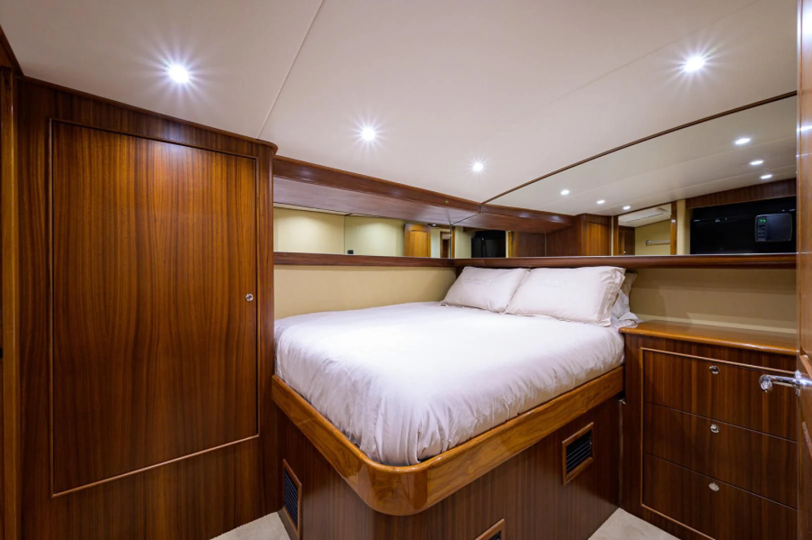 a bed in a room aboard FLYING J Yacht for Sale