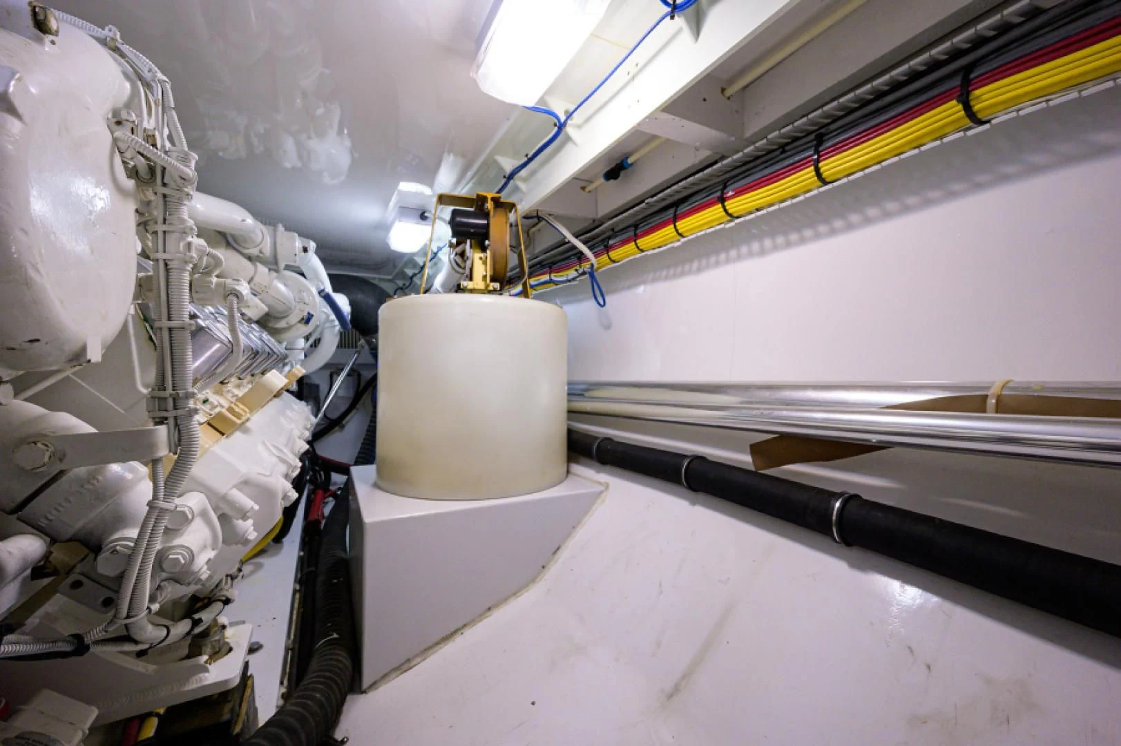 a white chair in a room aboard FLYING J Yacht for Sale