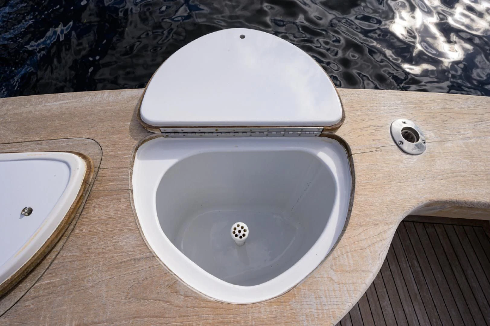 a toilet with a sink aboard FLYING J Yacht for Sale