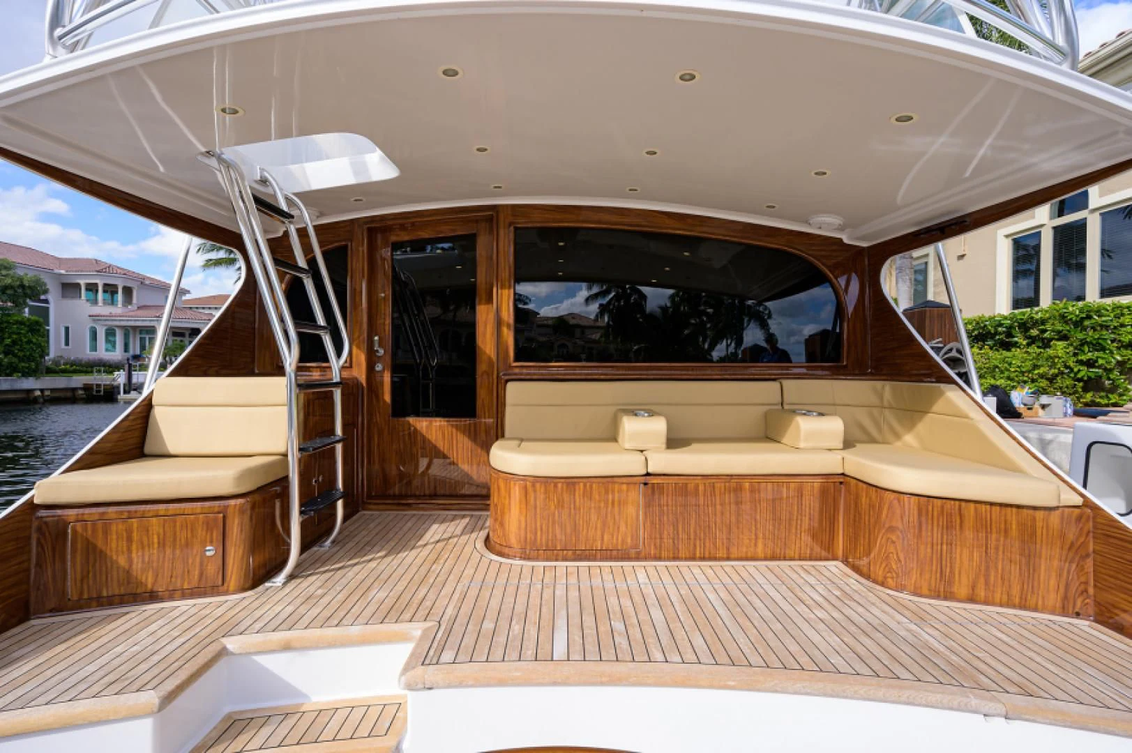 a deck with a view of the water and a staircase aboard FLYING J Yacht for Sale