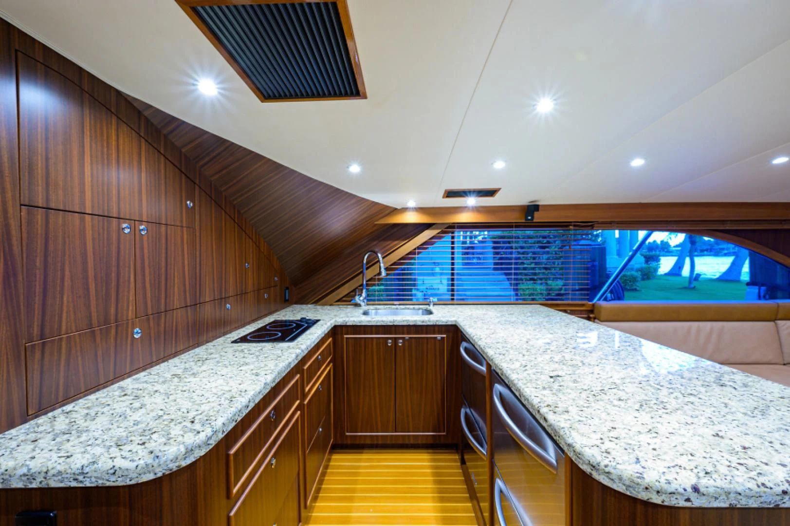 a kitchen with a large island aboard FLYING J Yacht for Sale