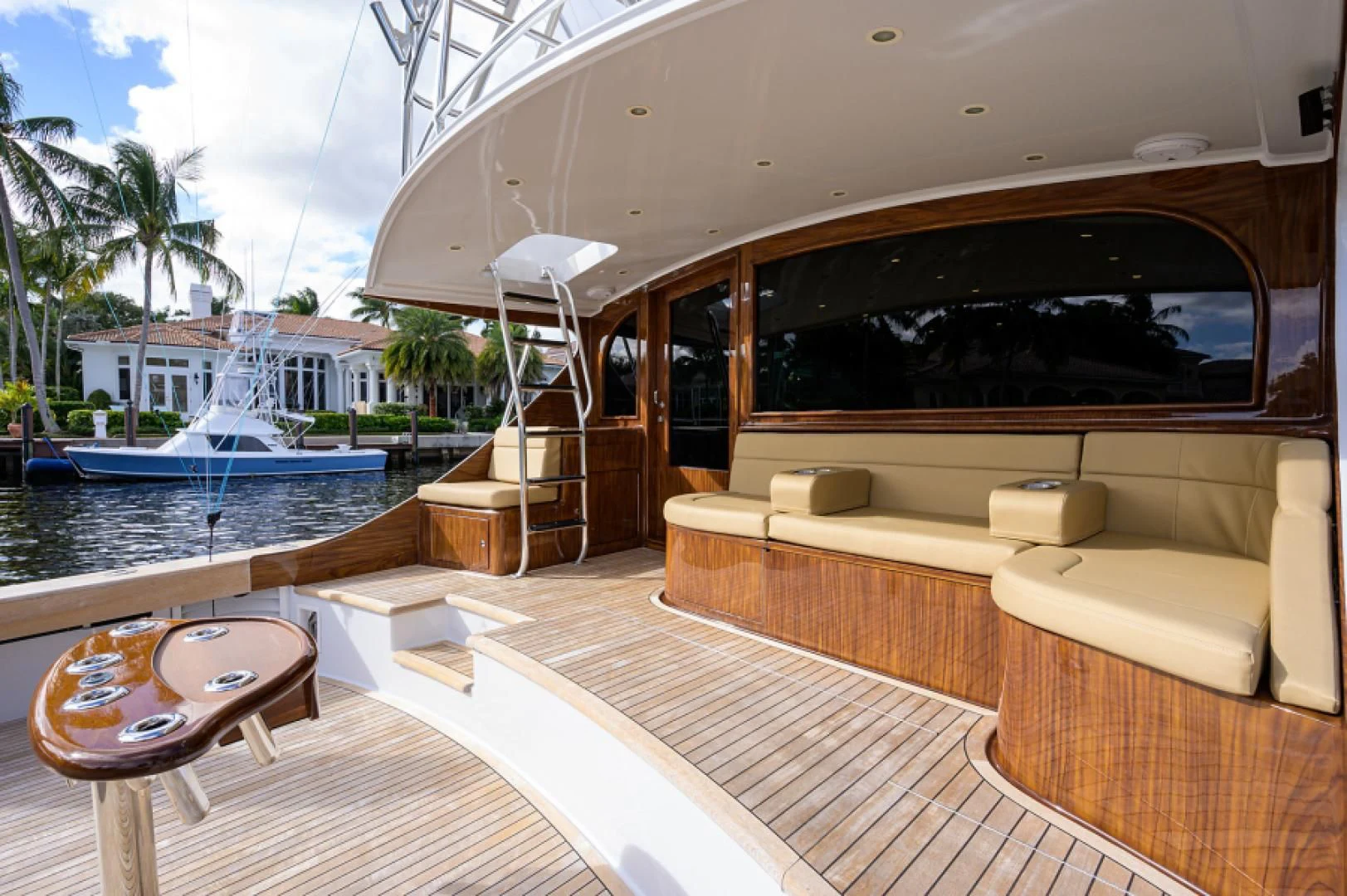 a room with a couch and a pool aboard FLYING J Yacht for Sale