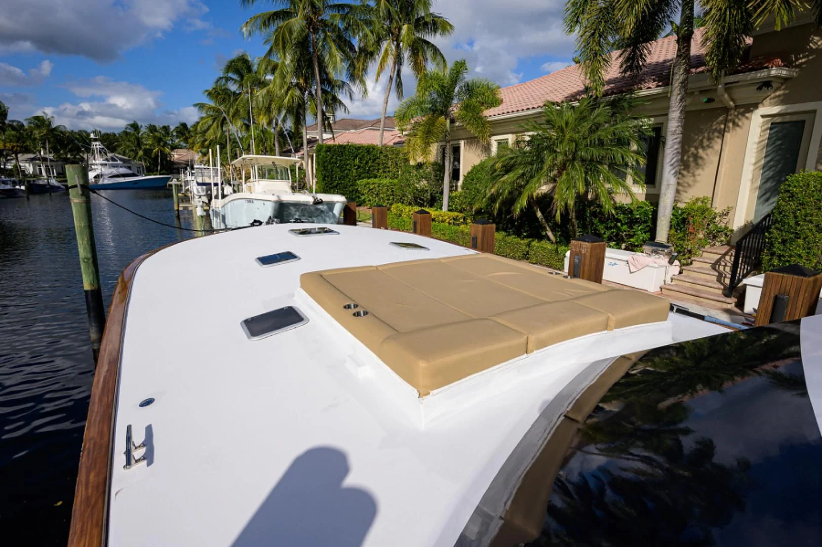 a white boat on a body of water aboard FLYING J Yacht for Sale