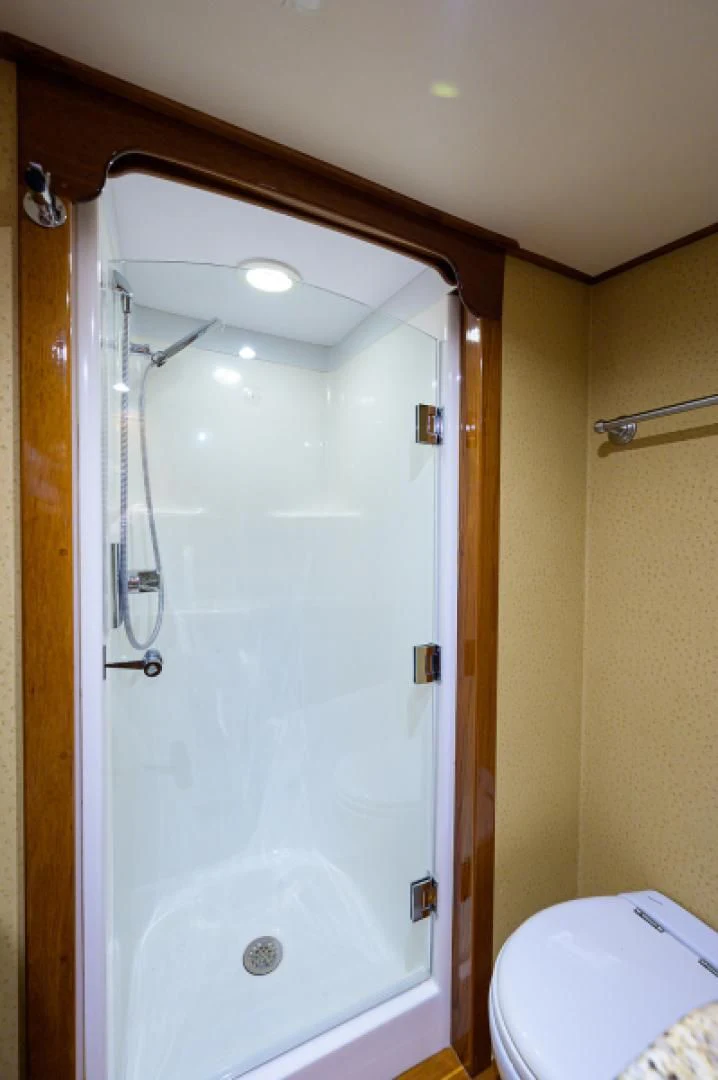 a shower with a glass door aboard FLYING J Yacht for Sale