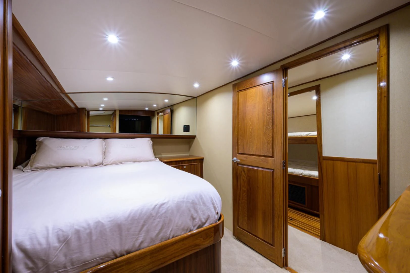 a bed in a room aboard FLYING J Yacht for Sale