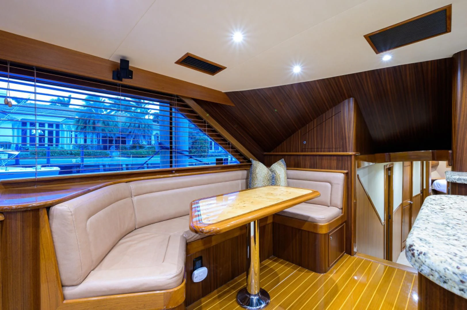 a room with a couch and a table and a television aboard FLYING J Yacht for Sale