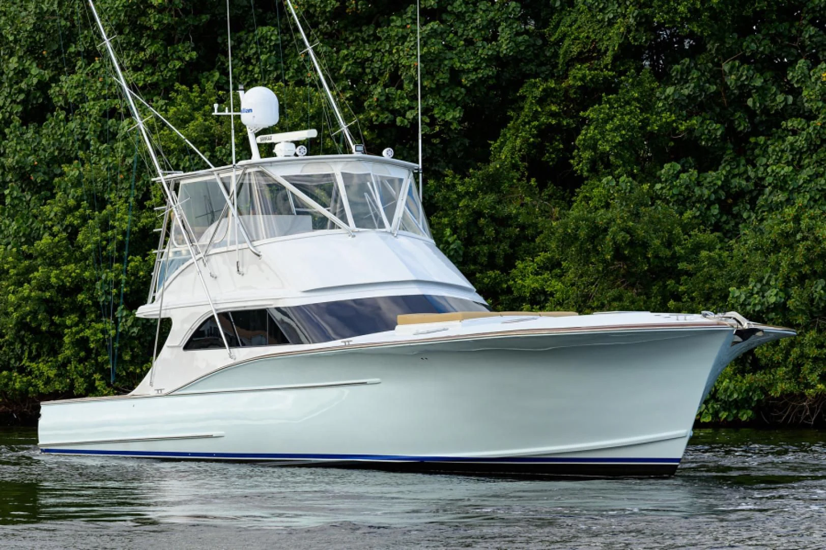 a white boat on the water aboard FLYING J Yacht for Sale