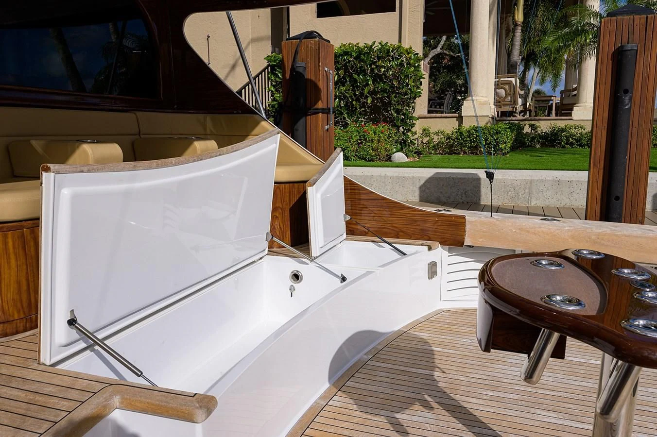a large white bathtub in a room with a table and chairs aboard FLYING J Yacht for Sale