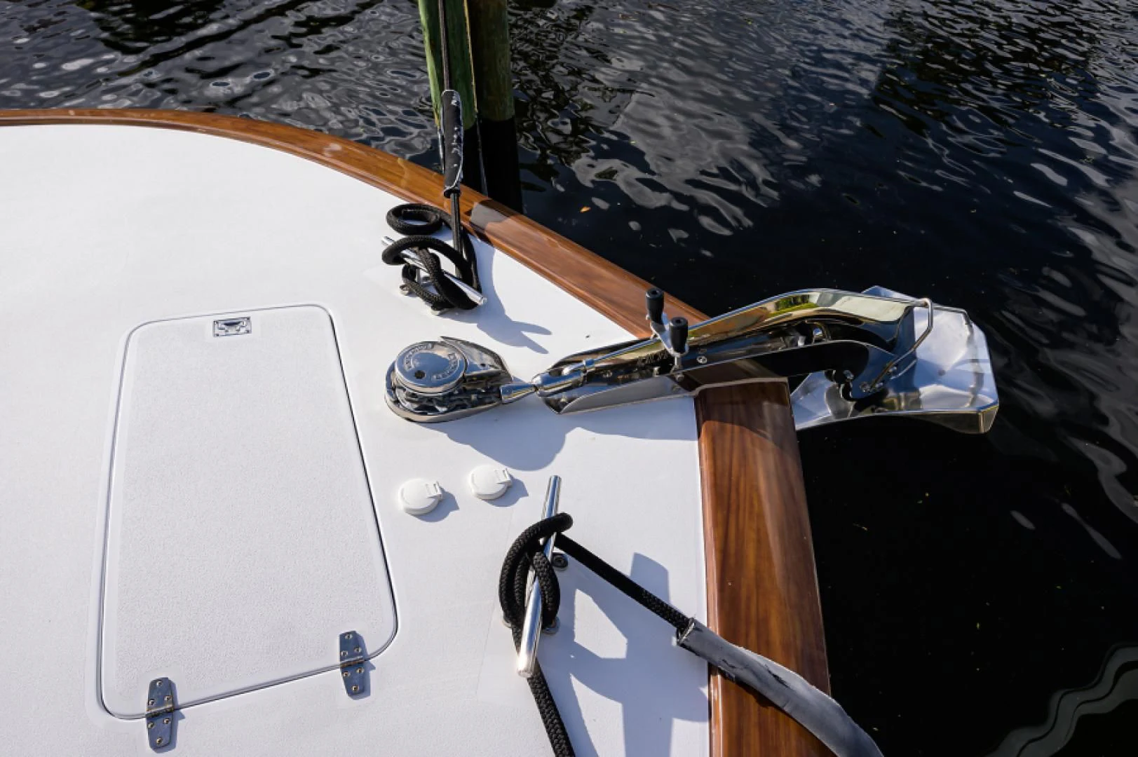 a white boat with a black background aboard FLYING J Yacht for Sale