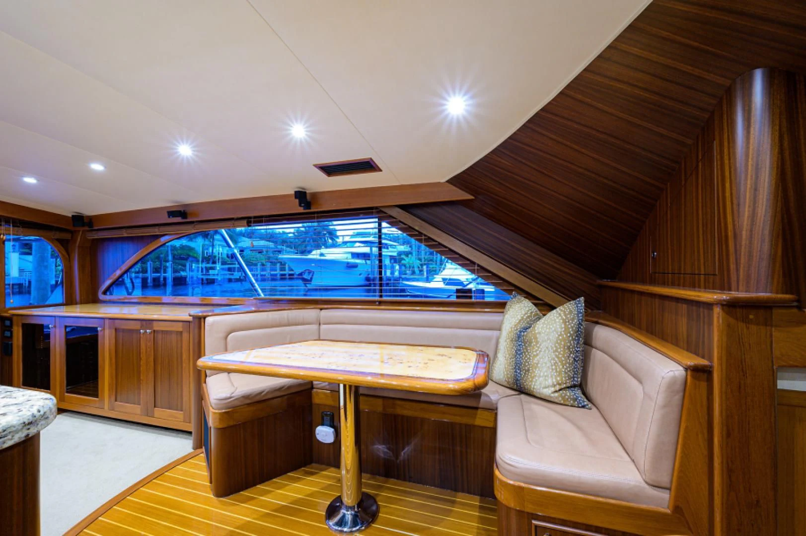 a room with a table and chairs aboard FLYING J Yacht for Sale