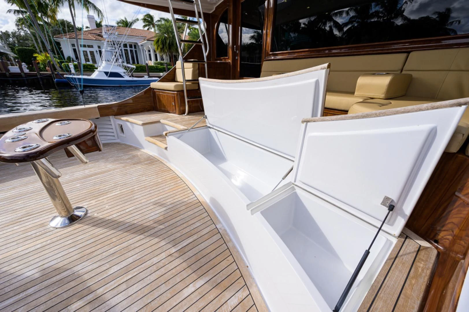 a room with a chair and a table and a pool aboard FLYING J Yacht for Sale