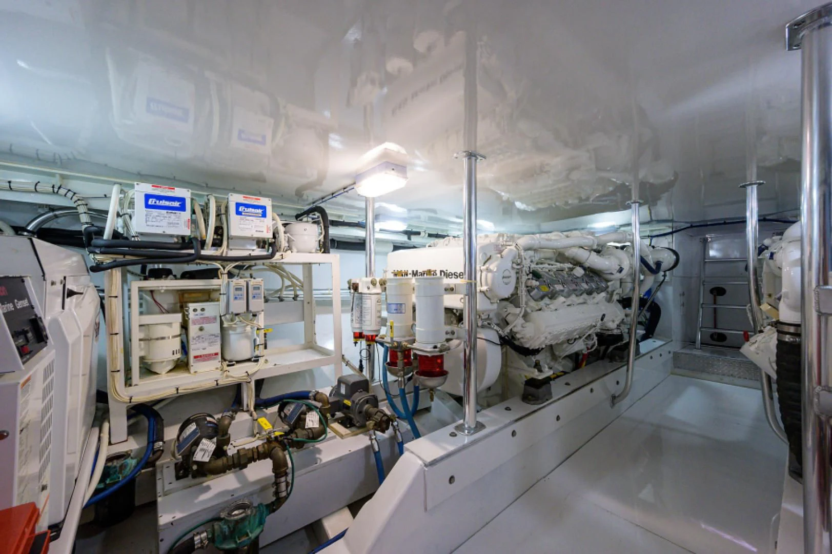 a room with white machines aboard FLYING J Yacht for Sale