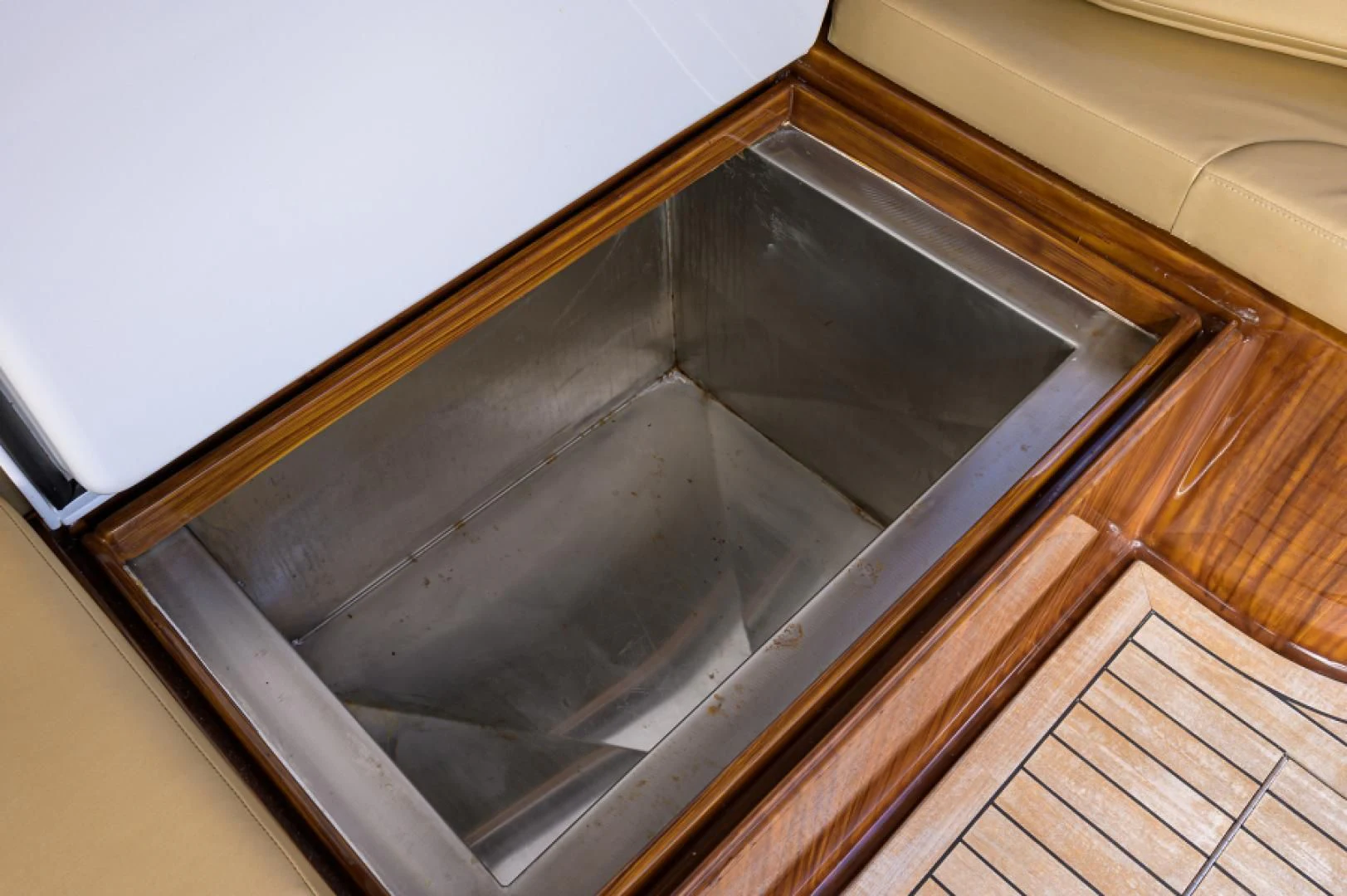 a wooden cabinet with glass doors aboard FLYING J Yacht for Sale