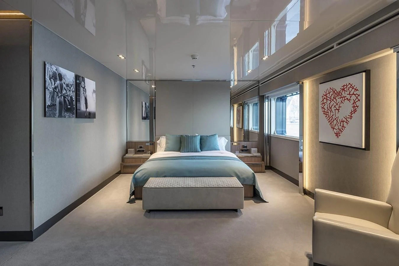 a large bedroom with a bed aboard MARQUISE Yacht for Sale