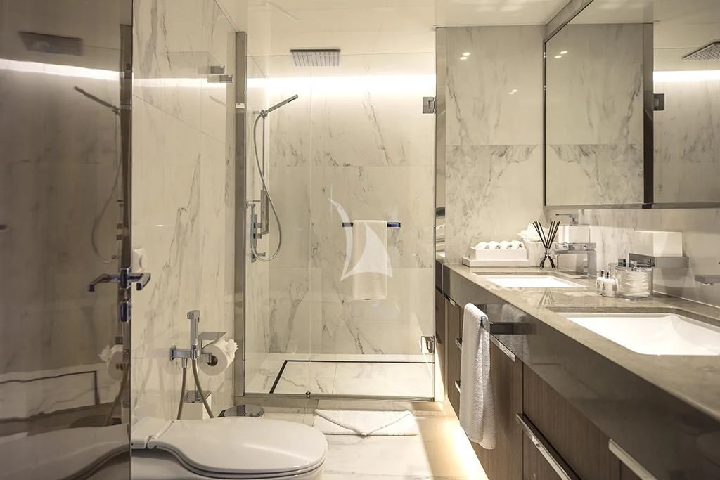 a bathroom with a glass shower aboard MARQUISE Yacht for Sale