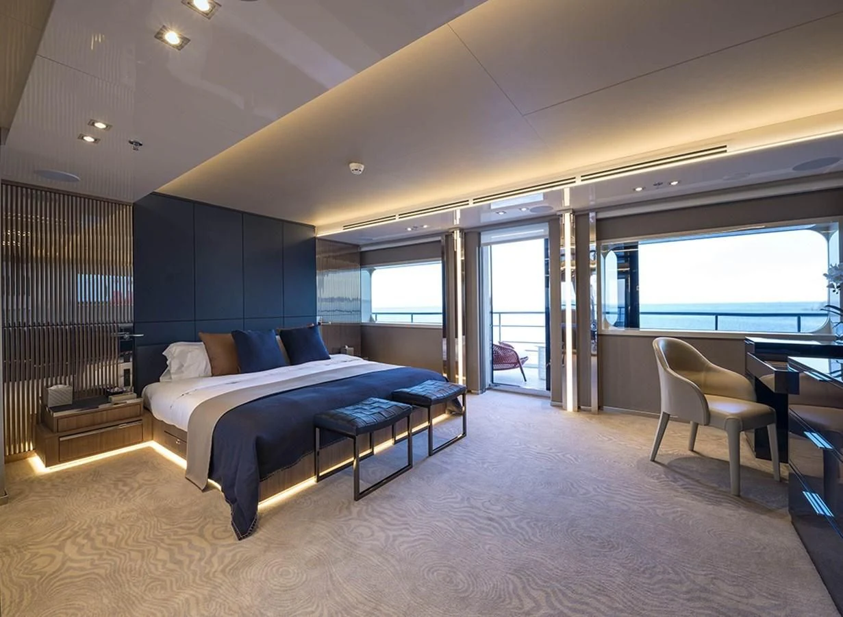 a large bedroom with a large bed aboard MARQUISE Yacht for Sale