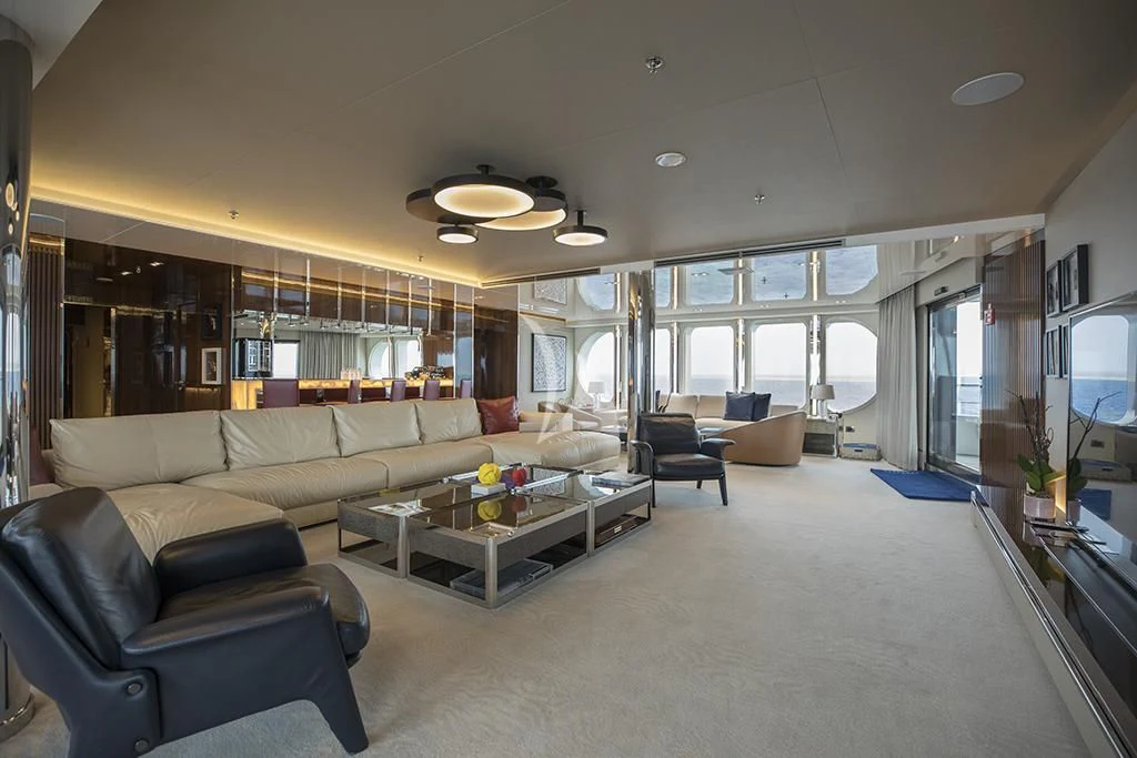 a living room with a couch and a coffee table aboard MARQUISE Yacht for Sale