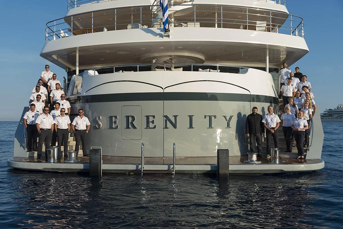 a group of people standing on a boat aboard MARQUISE Yacht for Sale