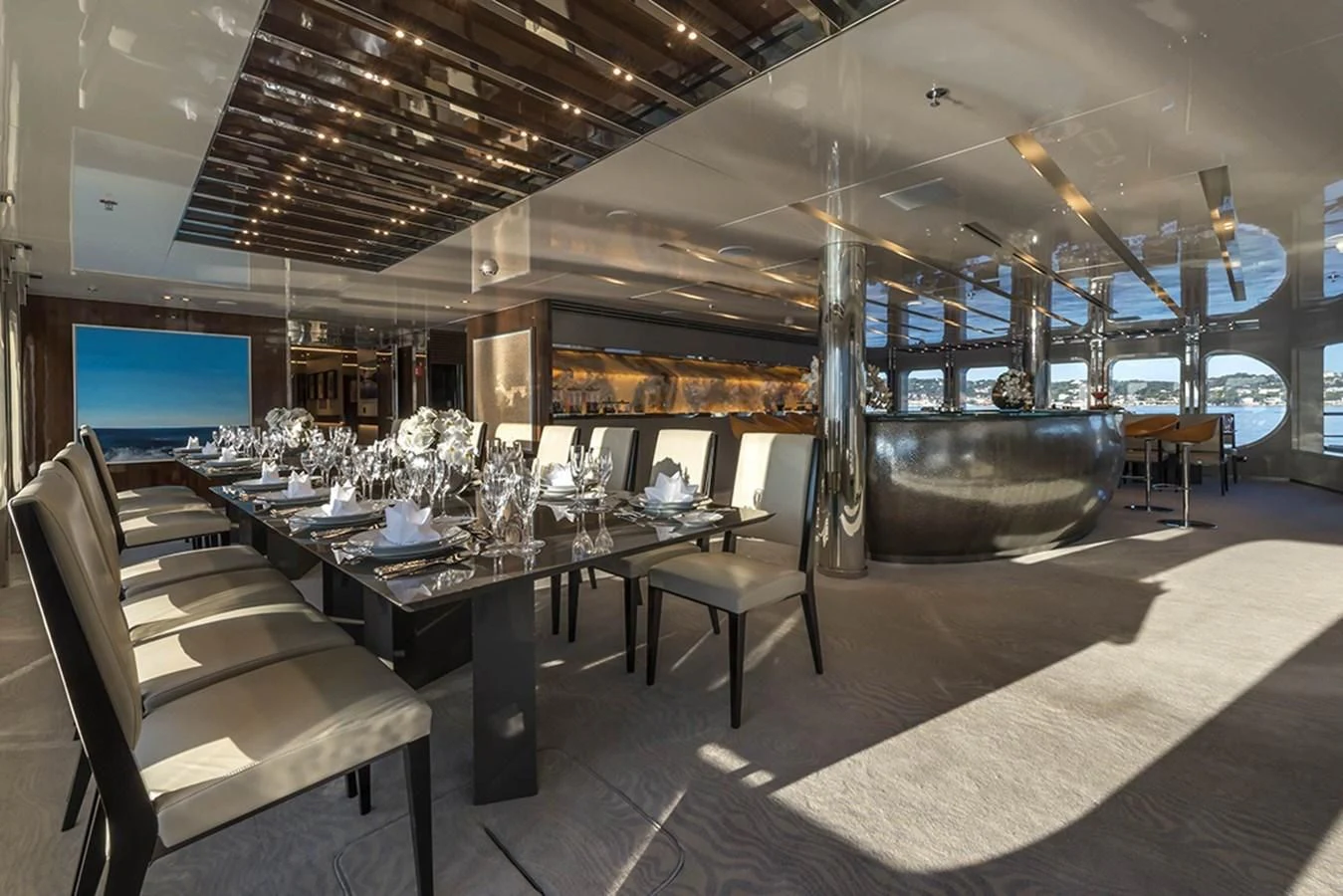 a room with a table and chairs aboard MARQUISE Yacht for Sale