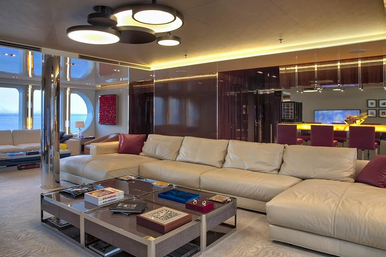 a living room with a couch and a coffee table aboard MARQUISE Yacht for Sale