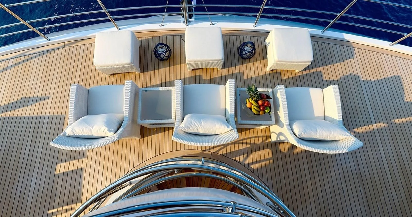 a table with chairs and plates aboard MARQUISE Yacht for Sale