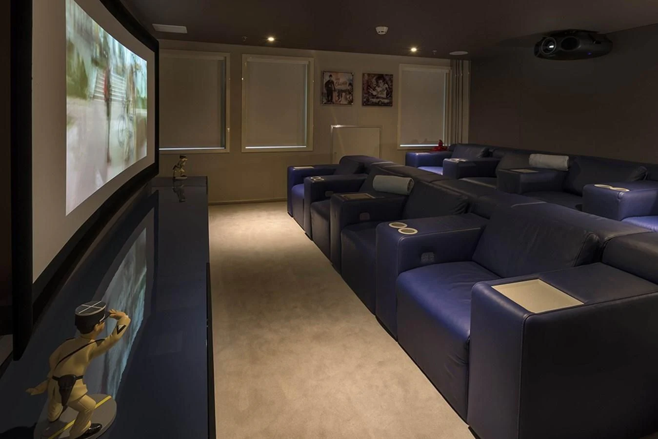 a living room with a large screen aboard MARQUISE Yacht for Sale