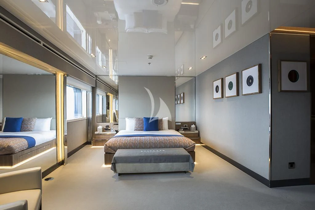 a room with a bed and a desk aboard MARQUISE Yacht for Sale